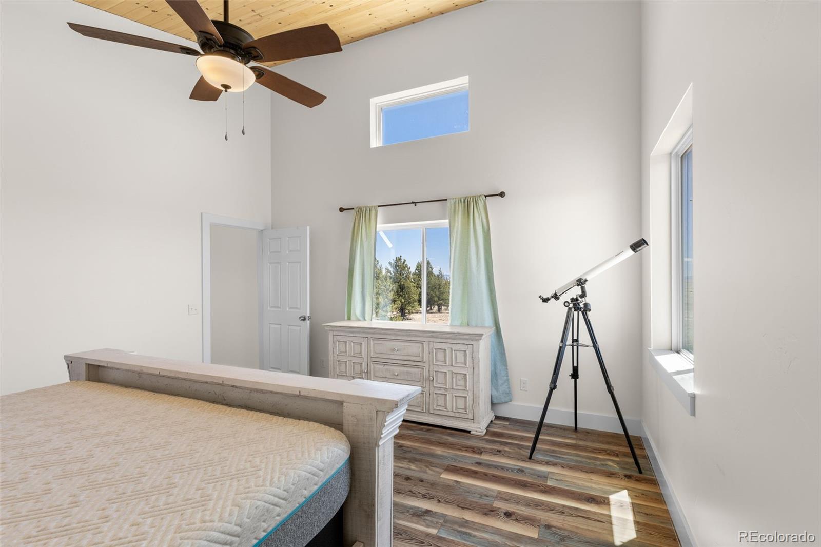 431 Rudisill Street Fairplay, CO 80440 - Photo 23 of 48 a bedroom with a bed and a window