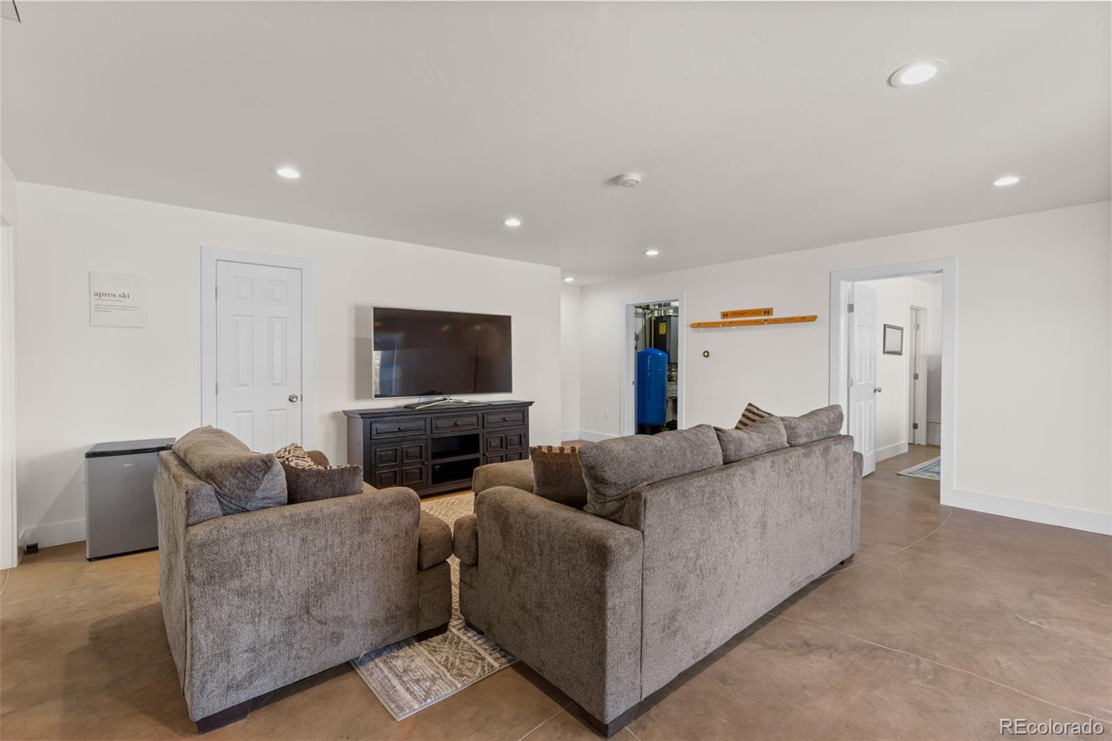 431 Rudisill Street Fairplay, CO 80440 - Photo 30 of 48 a living room with furniture and a flat screen tv