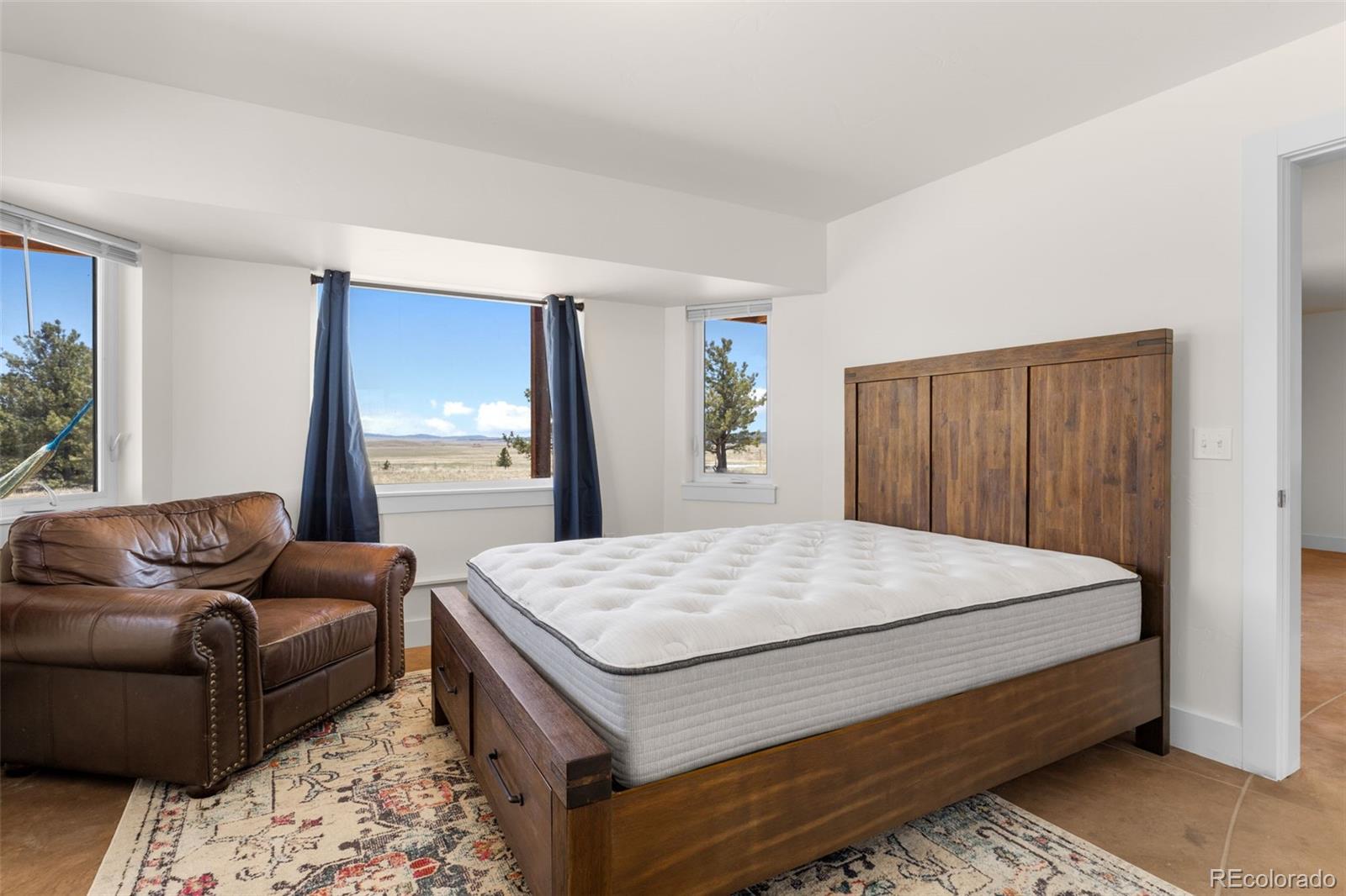 431 Rudisill Street Fairplay, CO 80440 - Photo 33 of 48 a bed room with a bed and a couch