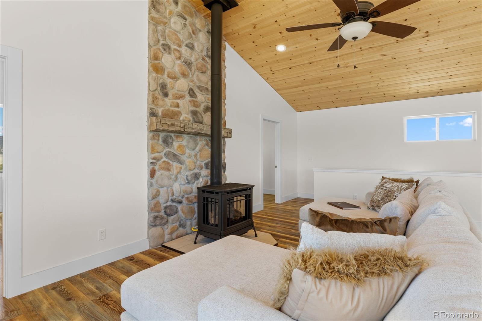 431 Rudisill Street Fairplay, CO 80440 - Photo 4 of 48 a living room with furniture and a wooden floor