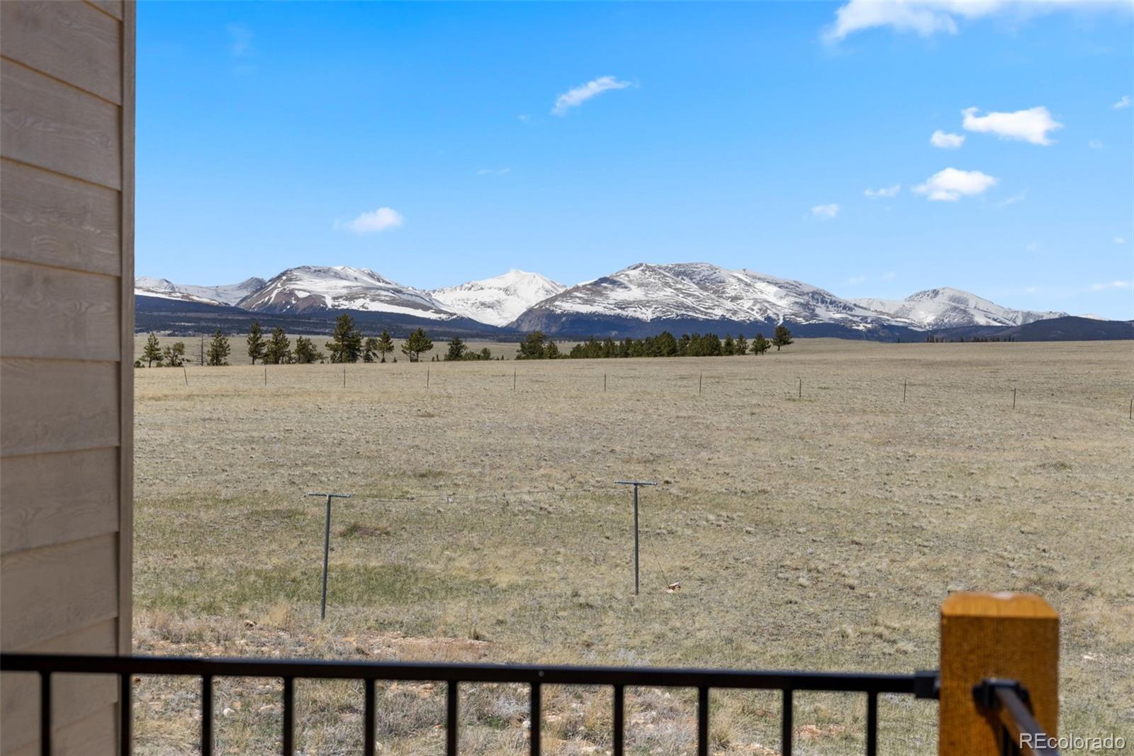 431 Rudisill Street Fairplay, CO 80440 - Photo 43 of 48 a view of a lake with a mountain in the background