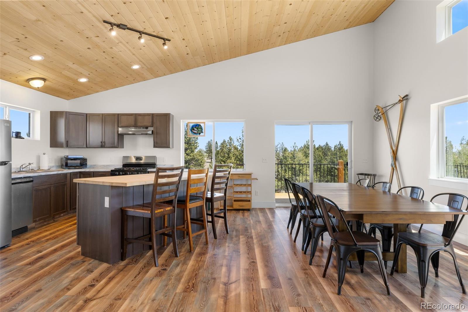 431 Rudisill Street Fairplay, CO 80440 - Photo 9 of 48 a view of a dining room with furniture window and wooden floor