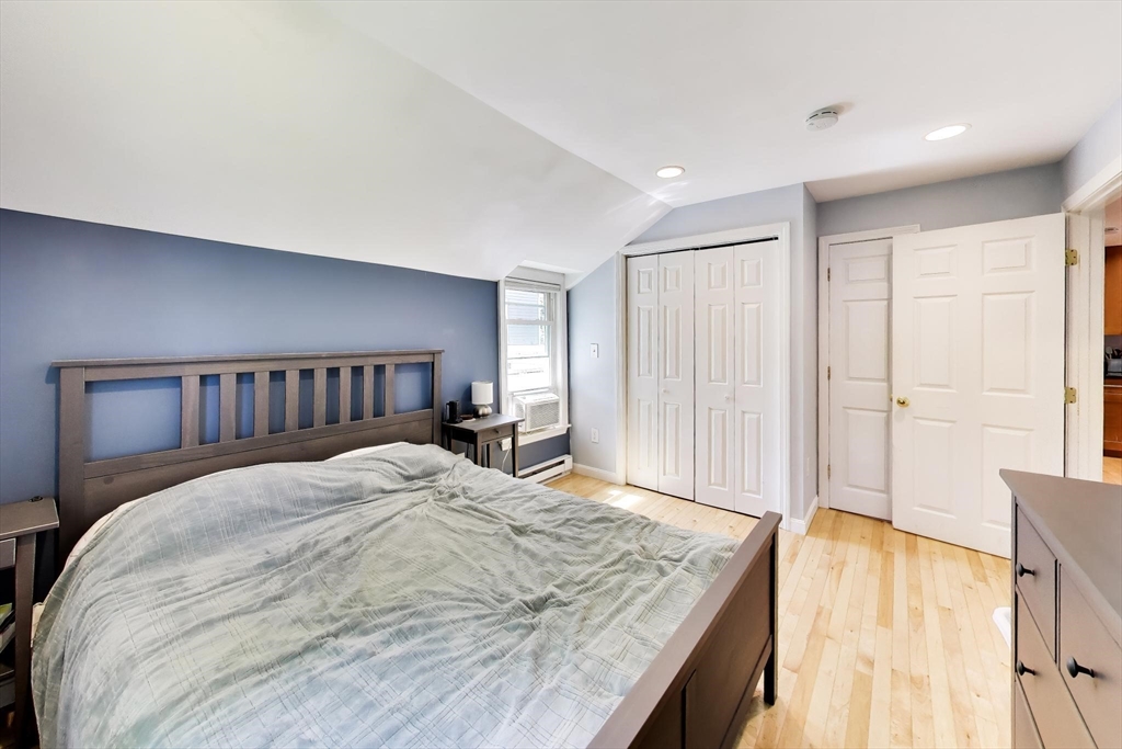 22 Douglas Road Ashland, MA 01721 - Photo 13 of 24 a spacious bedroom with a bed and a window