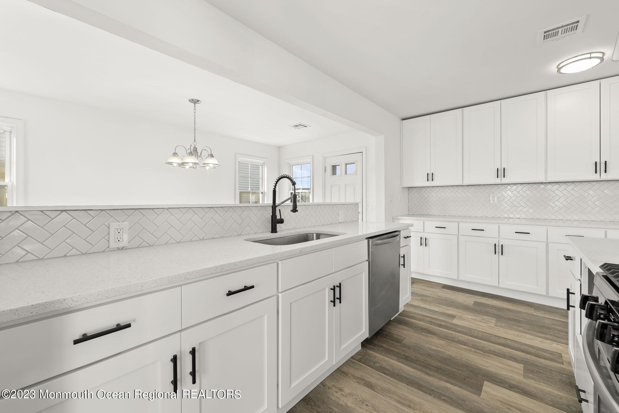 3 Hickory Hill Road Toms River, NJ 08753 - Photo 11 of 27 a kitchen with appliances cabinets and a sink