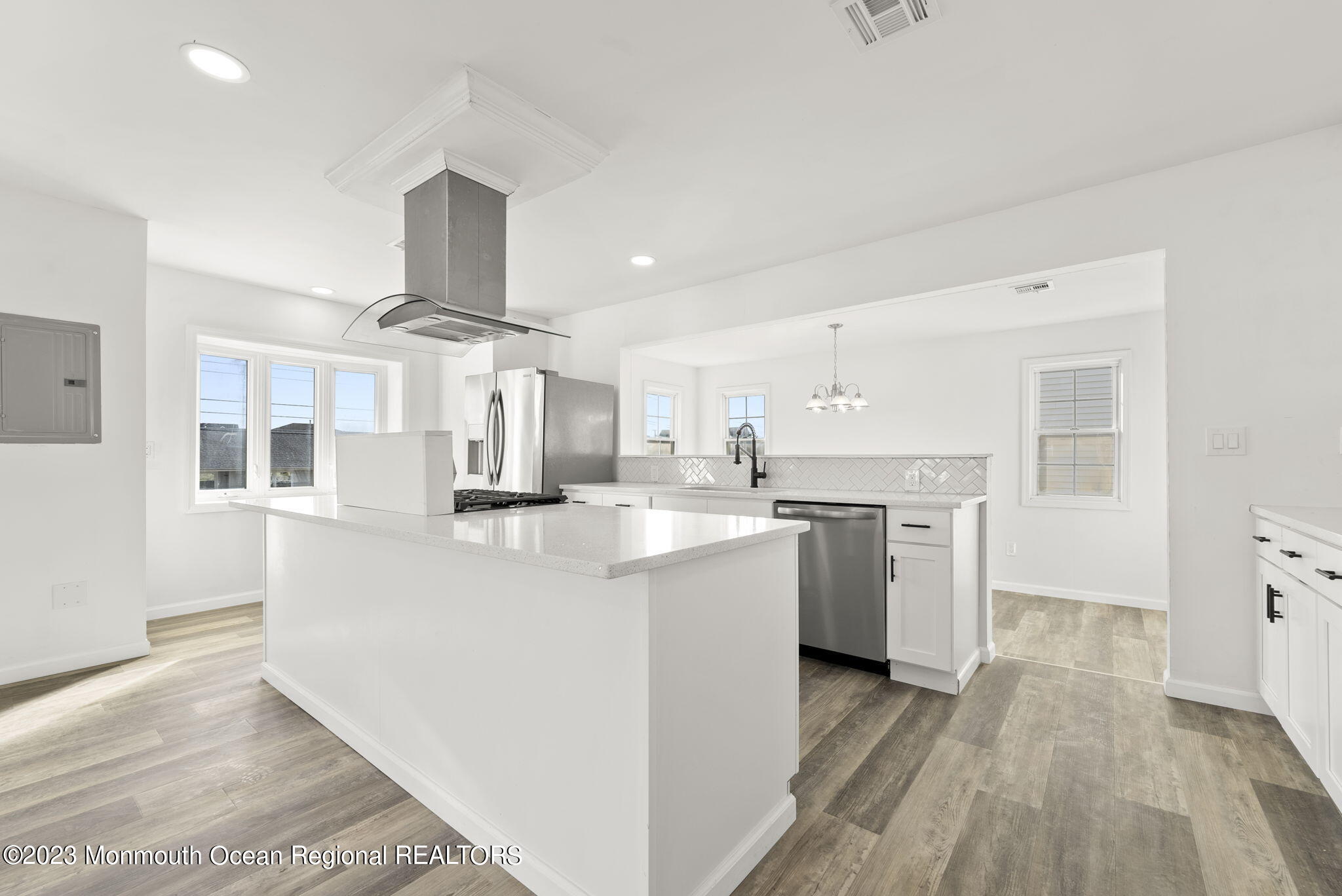3 Hickory Hill Road Toms River, NJ 08753 - Photo 12 of 27 a kitchen with stainless steel appliances a refrigerator sink and cabinets