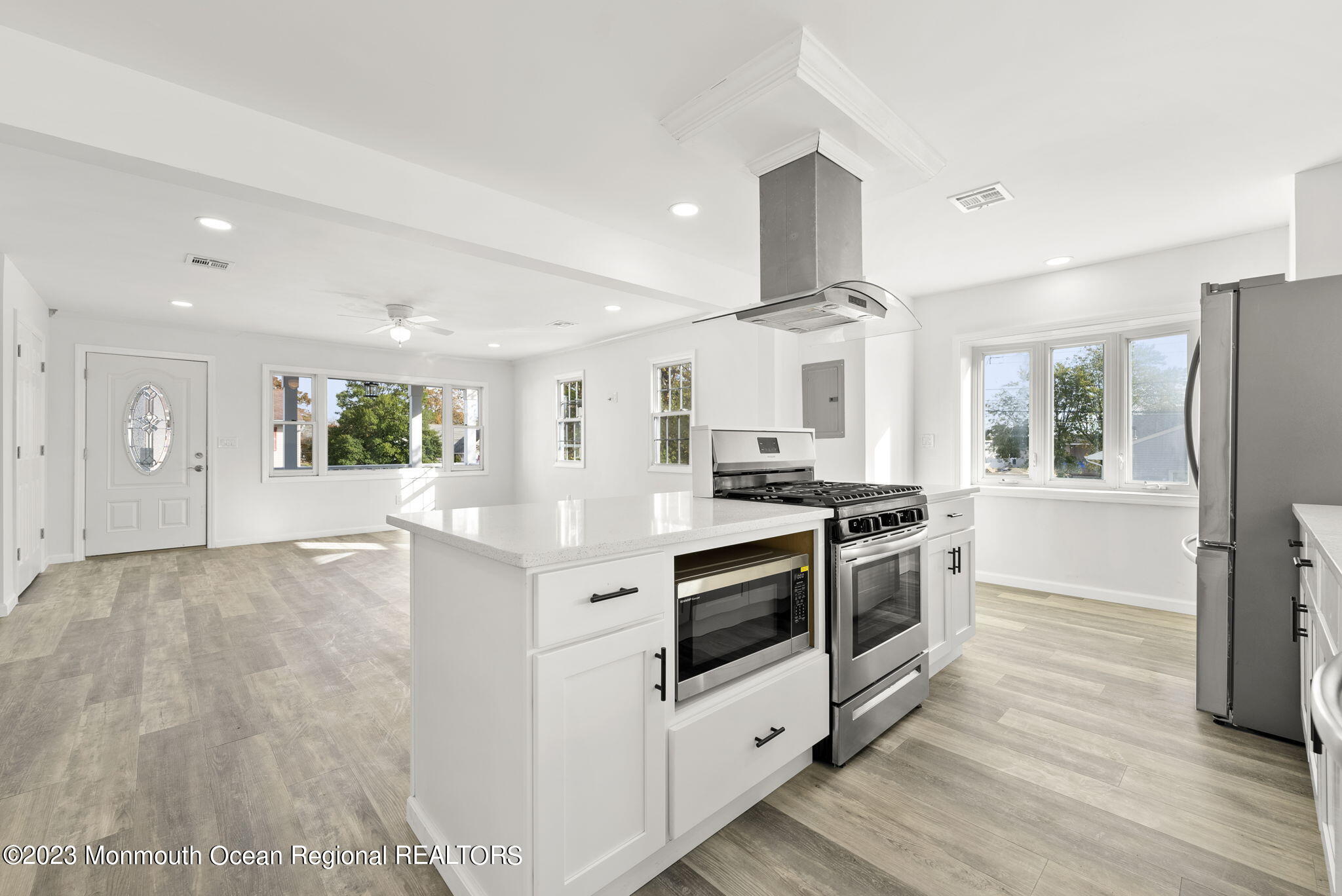 3 Hickory Hill Road Toms River, NJ 08753 - Photo 13 of 27 a kitchen with stainless steel appliances granite countertop a stove and a refrigerator