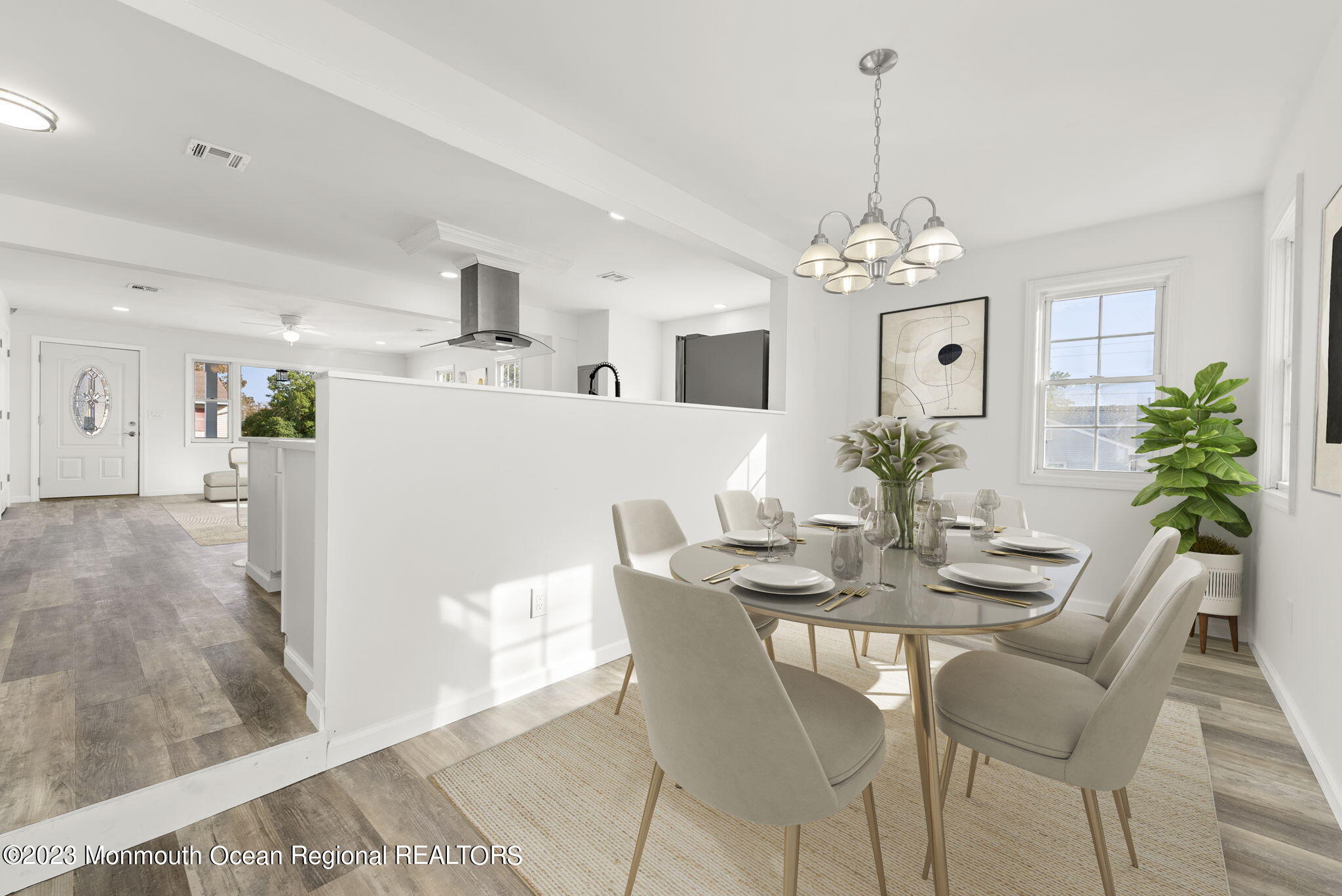 3 Hickory Hill Road Toms River, NJ 08753 - Photo 15 of 27 a dining room with furniture a chandelier and wooden floor