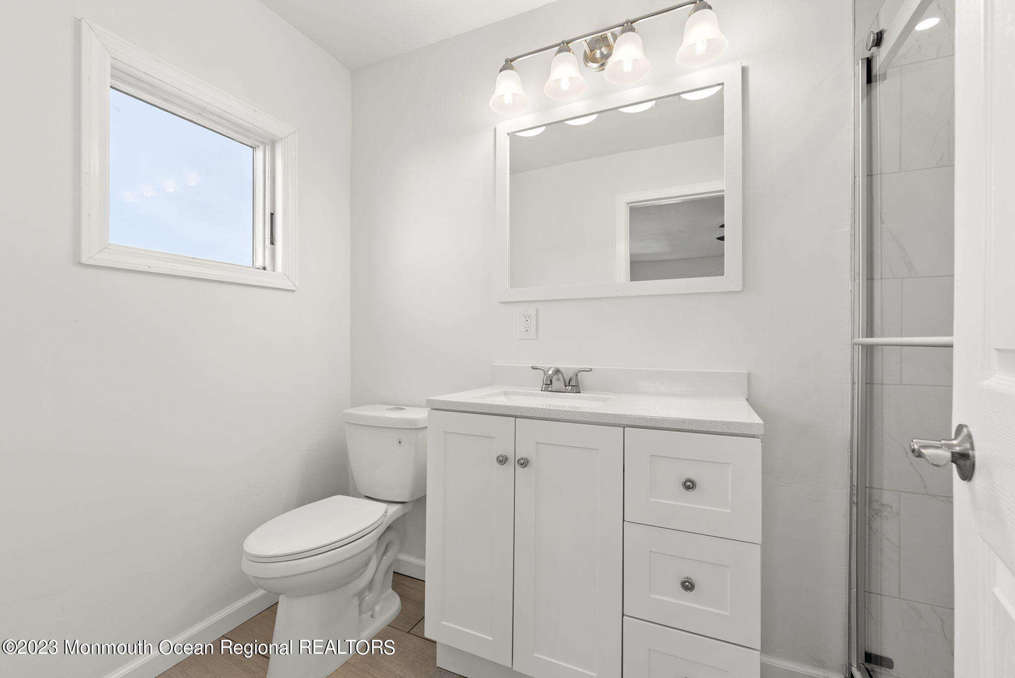 3 Hickory Hill Road Toms River, NJ 08753 - Photo 25 of 27 a bathroom with a toilet a sink and mirror