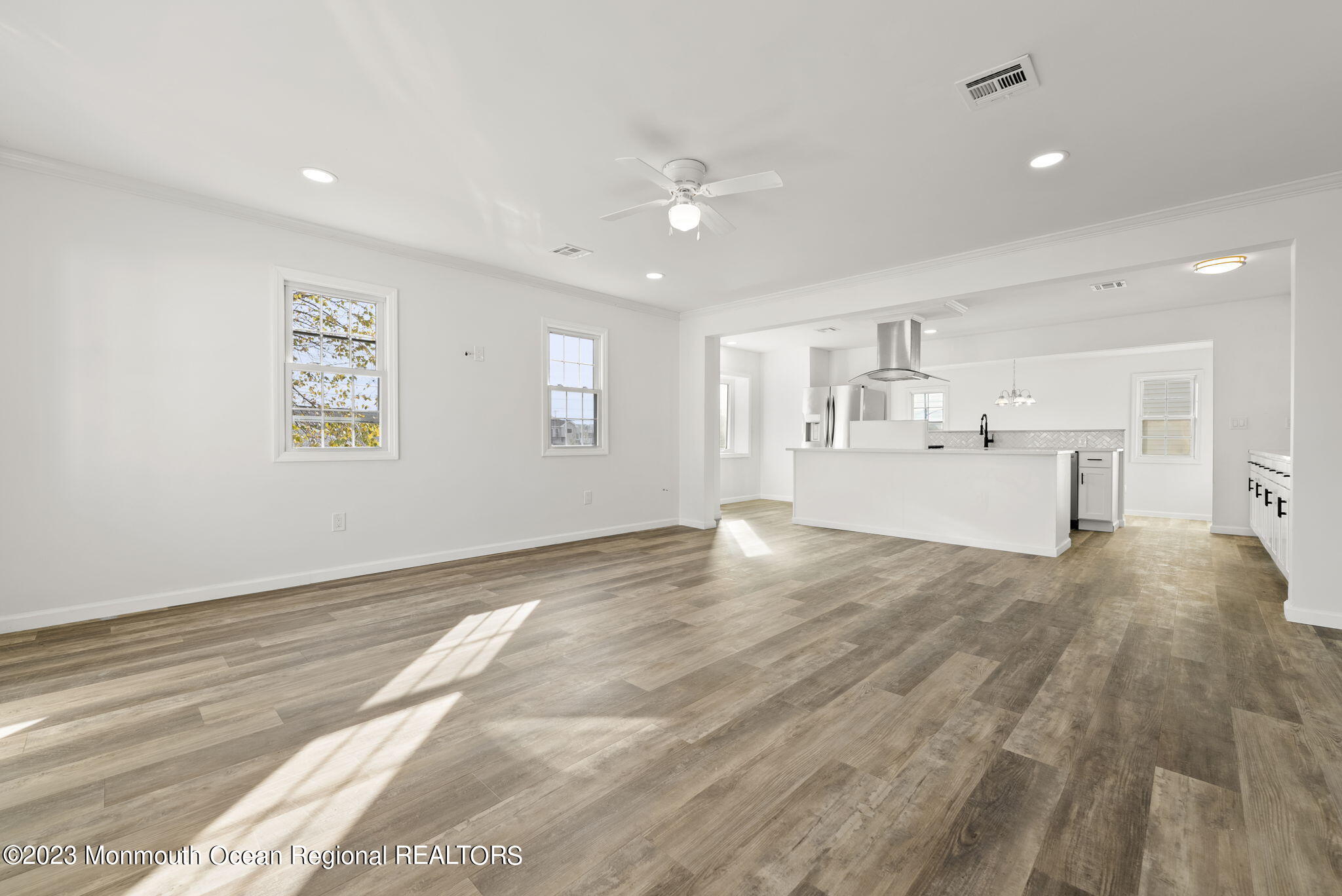 3 Hickory Hill Road Toms River, NJ 08753 - Photo 6 of 27 a view of an empty room with kitchen and window