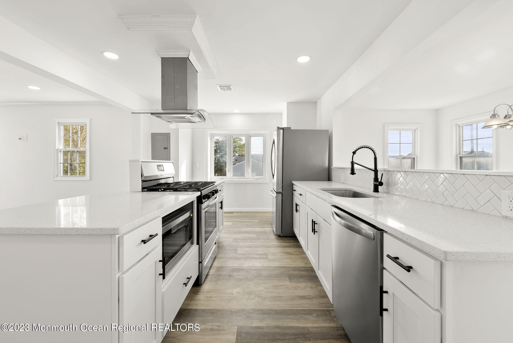 3 Hickory Hill Road Toms River, NJ 08753 - Photo 9 of 27 a large kitchen with stainless steel appliances lots of counter space and a sink