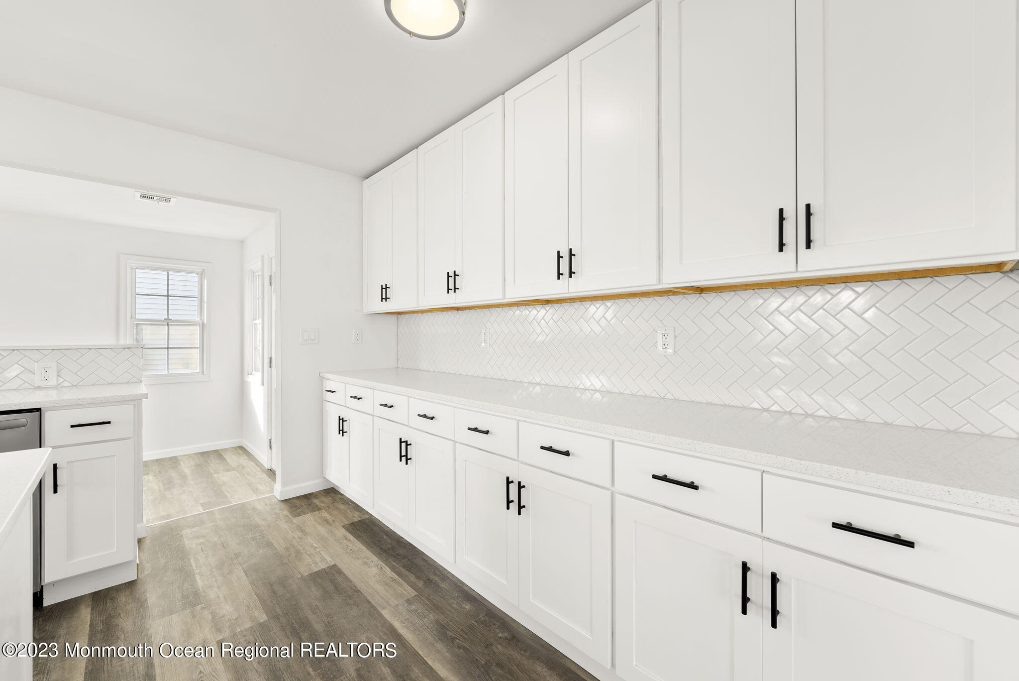 3 Hickory Hill Road Toms River, NJ 08753 - Photo 10 of 27 a kitchen with white cabinets and white appliances