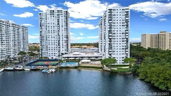 a view of a city with tall buildings