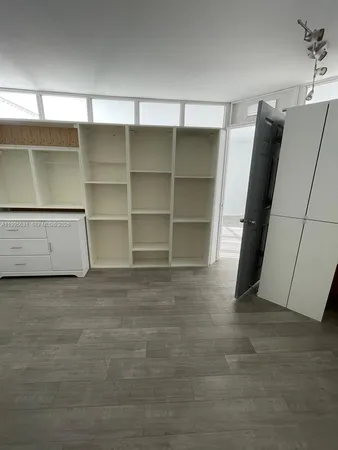 a living room with furniture fireplace and flat screen tv