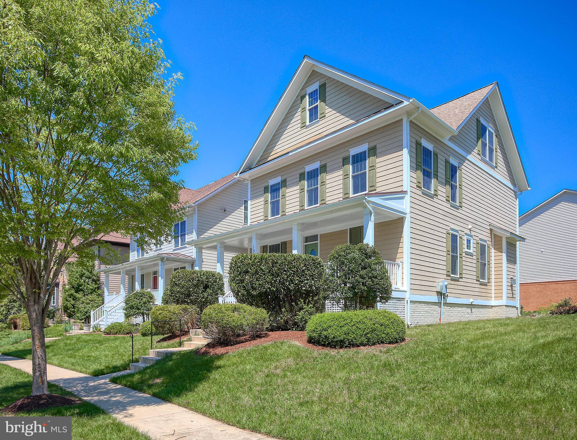 13501 Moonlight Trail Drive Silver Spring, MD 20906 - Photo 2 of 77 a front view of a house with a yard