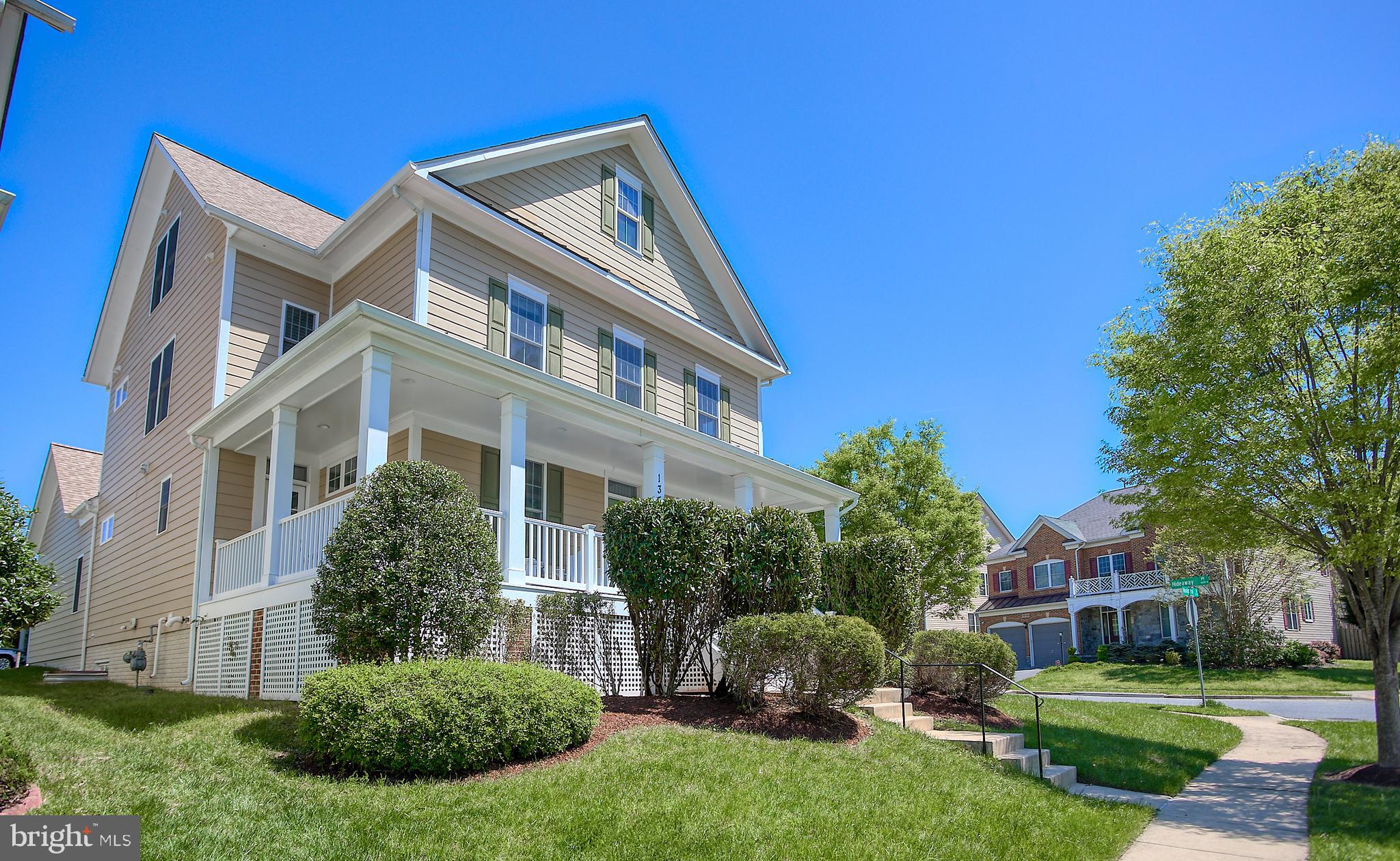 13501 Moonlight Trail Drive Silver Spring, MD 20906 - Photo 3 of 77 a view of a big yard with plants and large trees