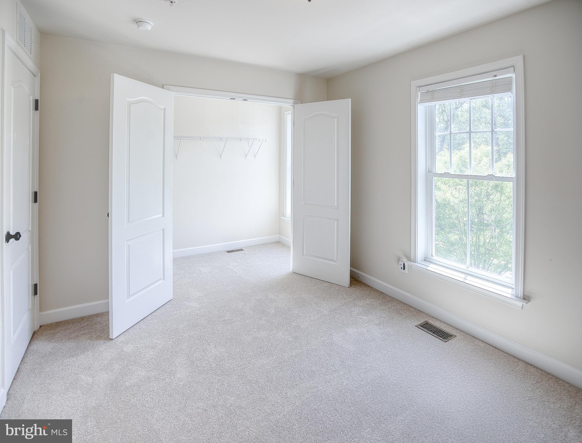 13501 Moonlight Trail Drive Silver Spring, MD 20906 - Photo 44 of 77 an empty room with windows