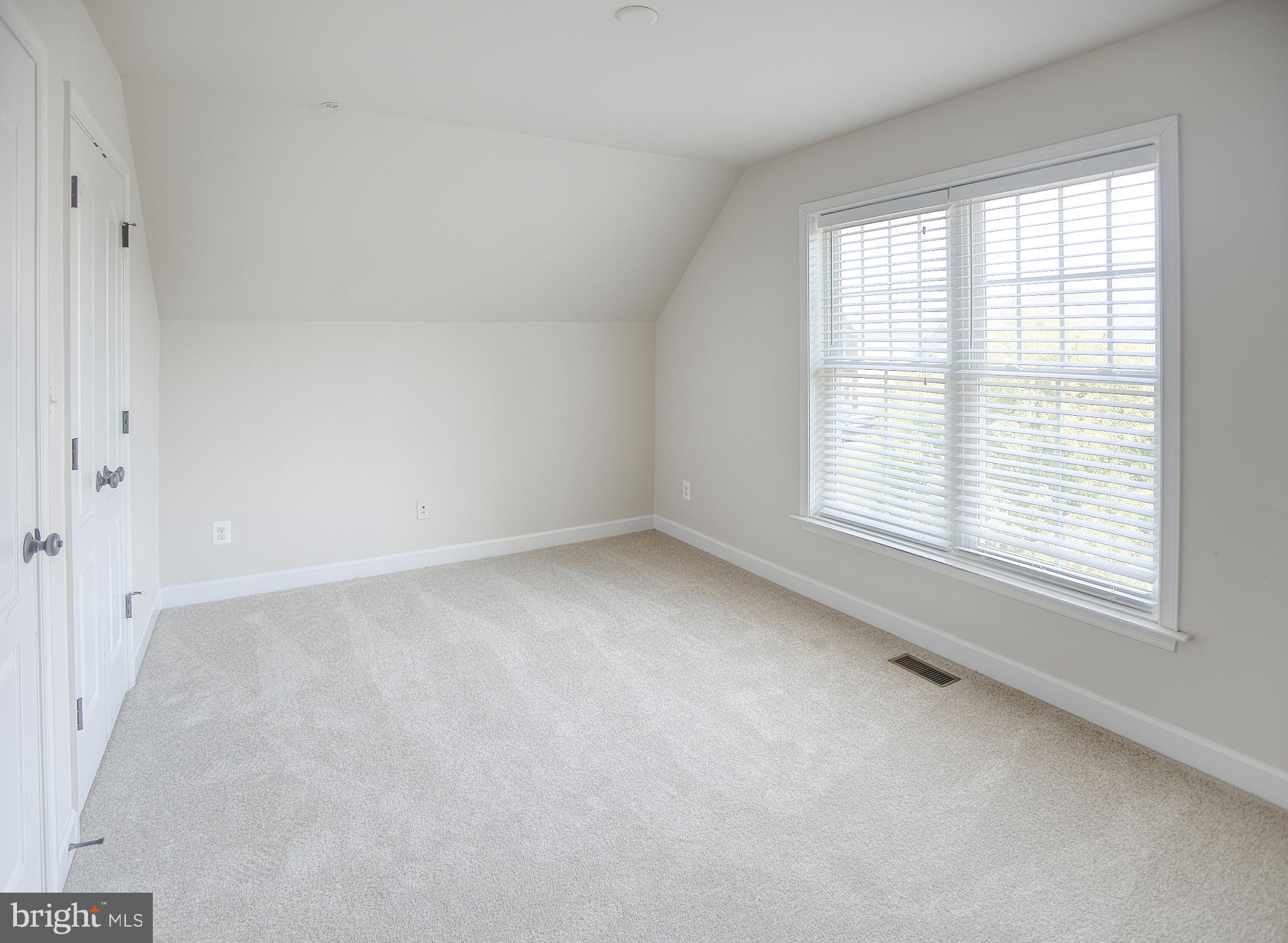 13501 Moonlight Trail Drive Silver Spring, MD 20906 - Photo 55 of 77 an empty room with a window
