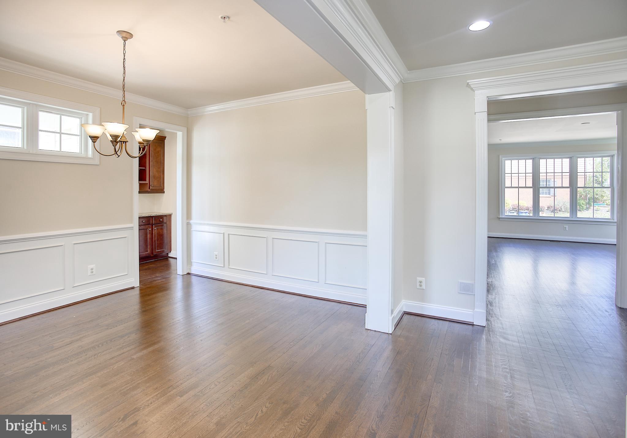 13501 Moonlight Trail Drive Silver Spring, MD 20906 - Photo 76 of 77 a view of a kitchen with wooden floor and window