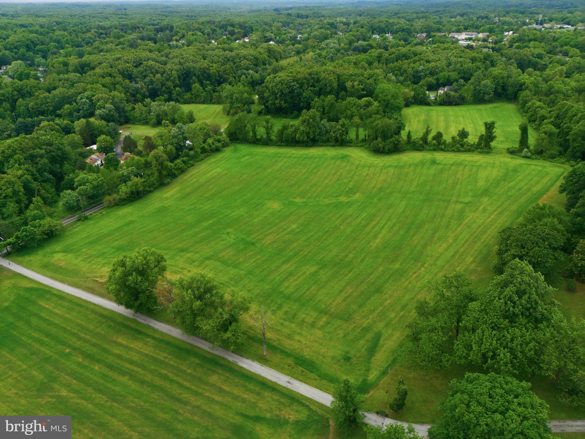 250 Ashton Road Ashton, MD 20861 - Photo 5 of 11 a view of a lush green field