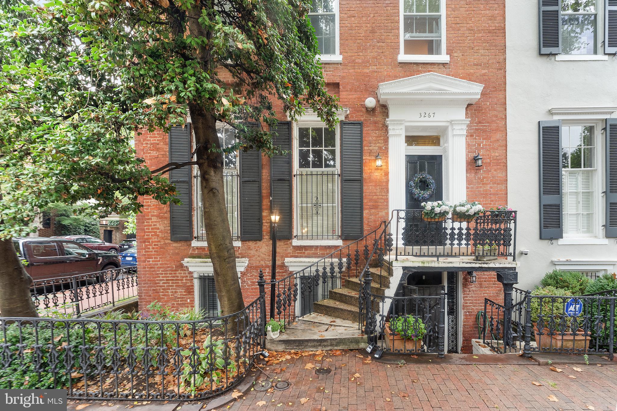 a front view of a building and outdoor space