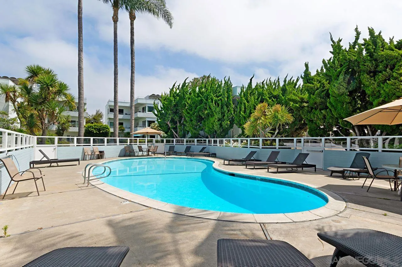 2362 Torrey Pines Road, Unit 33 La Jolla, CA 92037 - Photo 24 of 32 a view of a swimming pool with chairs
