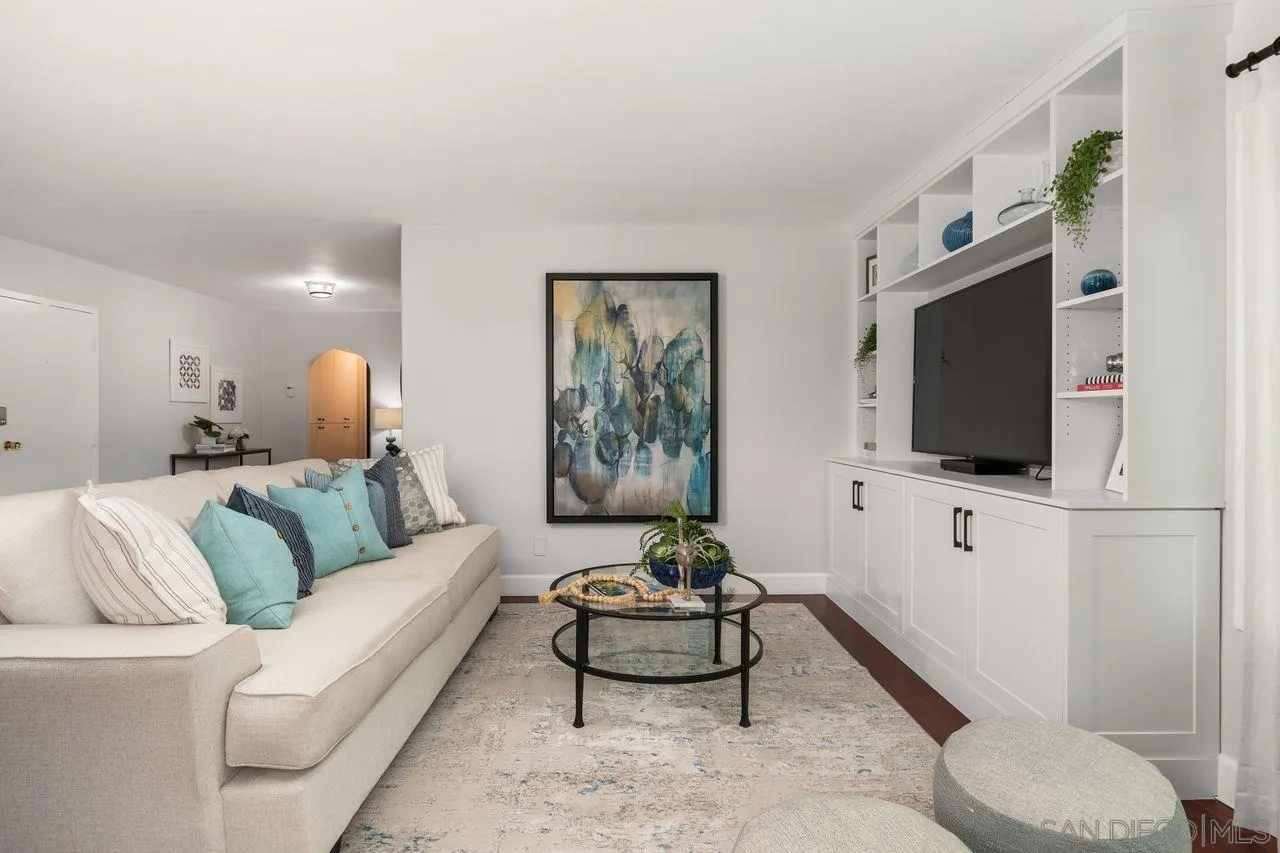 2362 Torrey Pines Road, Unit 33 La Jolla, CA 92037 - Photo 6 of 32 a living room with furniture and a flat screen tv