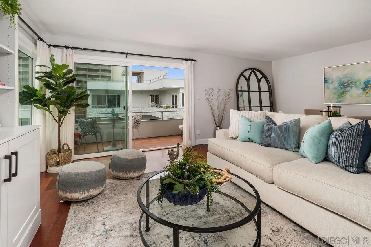 2362 Torrey Pines Road, Unit 33 La Jolla, CA 92037 - Photo 7 of 32 a living room with furniture and a large window