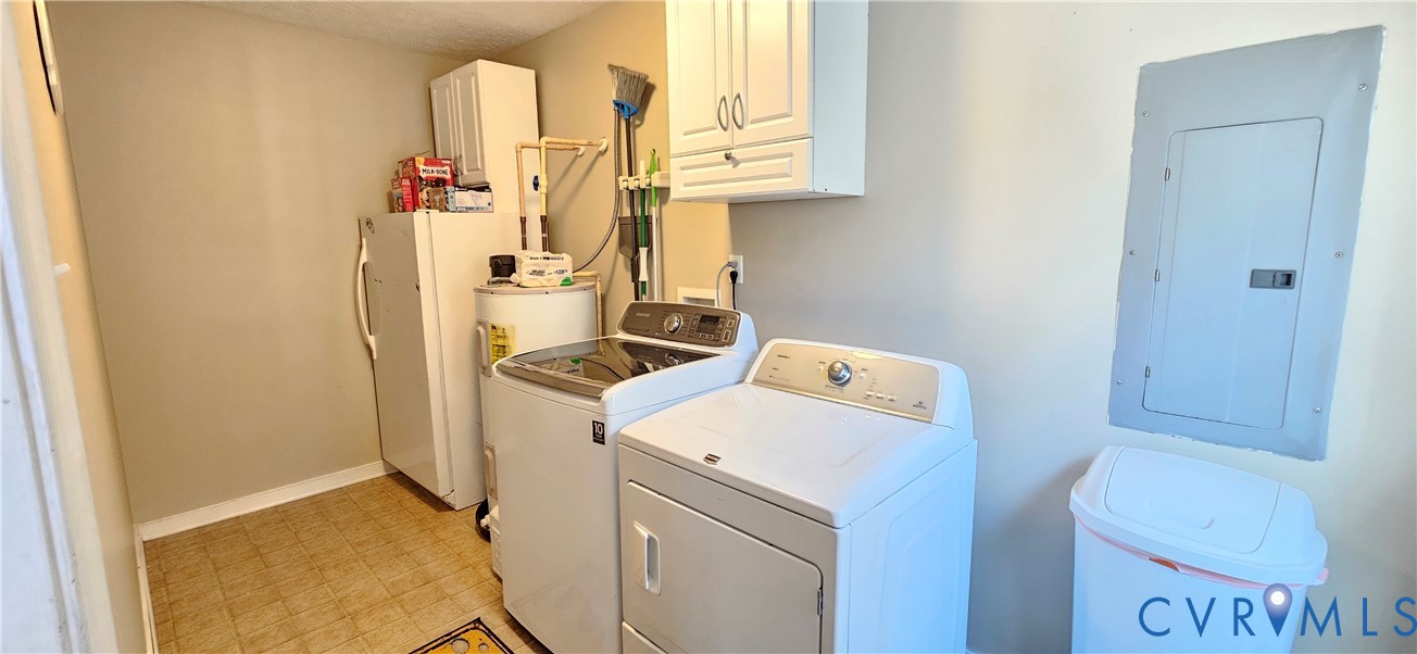 2239 Mantapike Landing Road Stevensville, VA 23161 - Photo 15 of 22 a utility room with dryer and washer