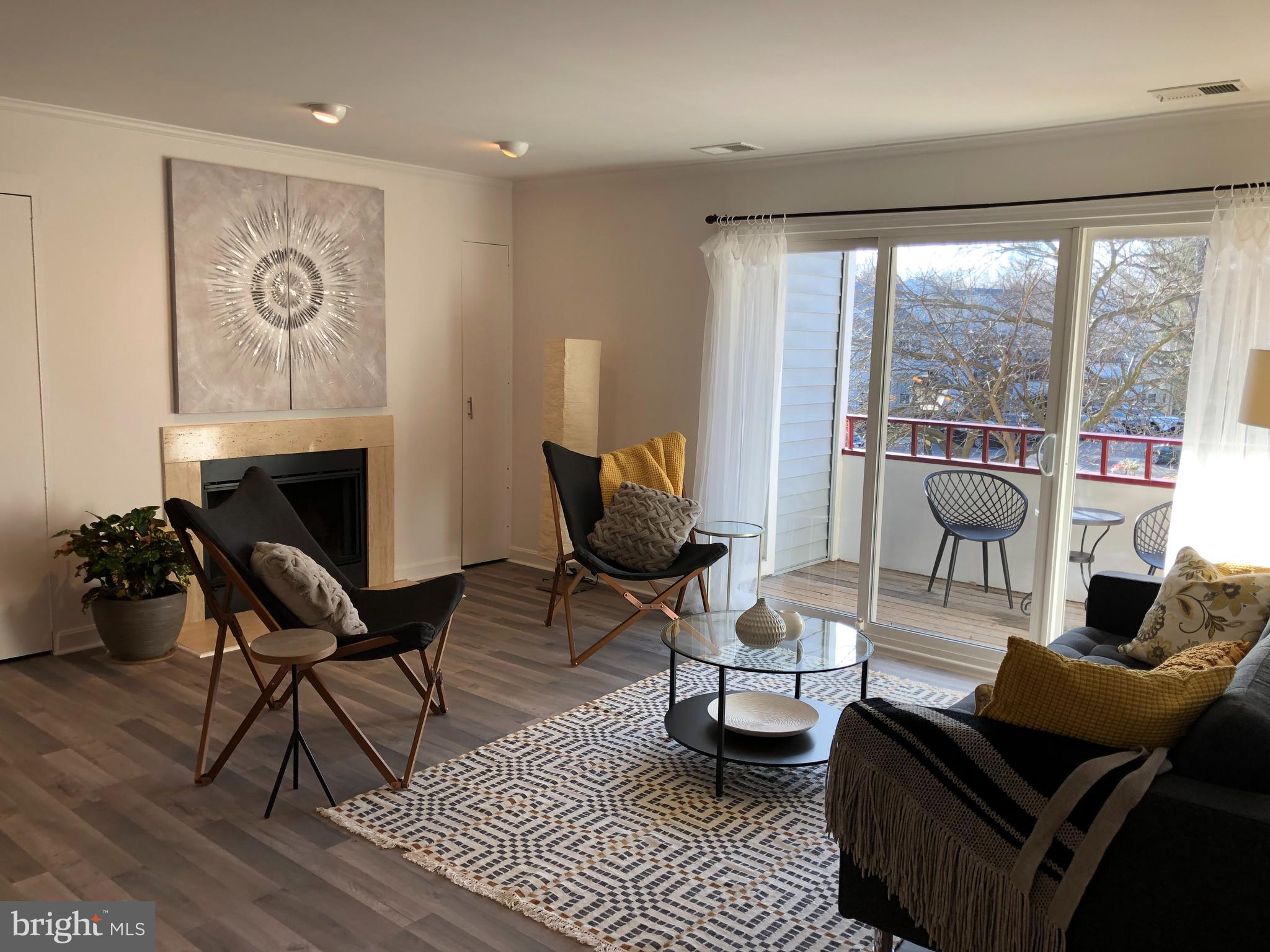 13705 Modrad Way, Unit 9A24 Silver Spring, MD 20904 - Photo 1 of 9 Spacious and Sunny Living Room