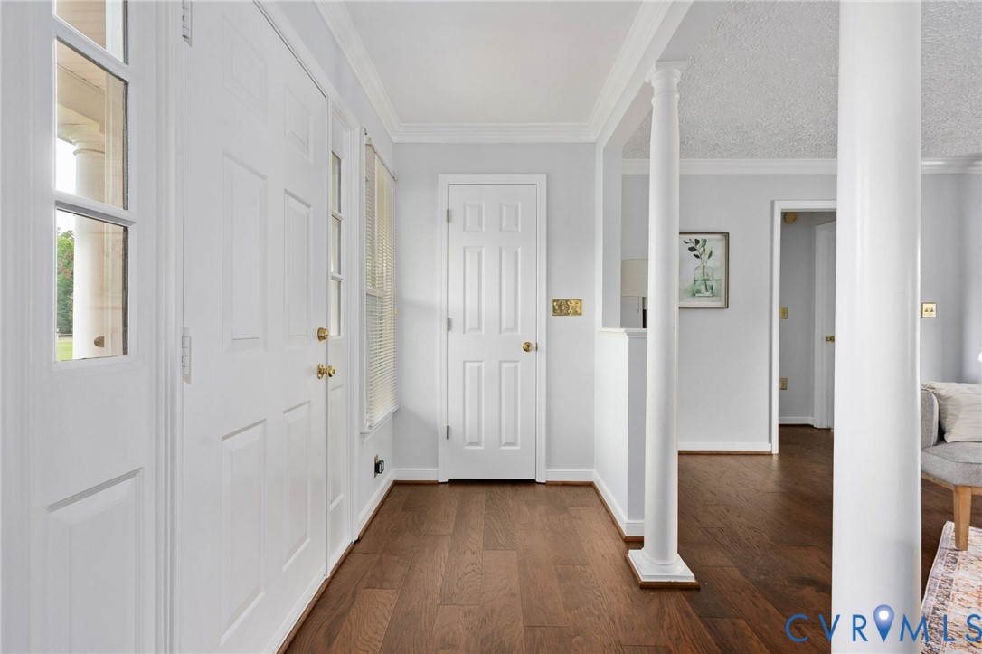 16379 Arch Hill Road Hanover, VA 23069 - Photo 3 of 26 a view of a hallway with wooden floor