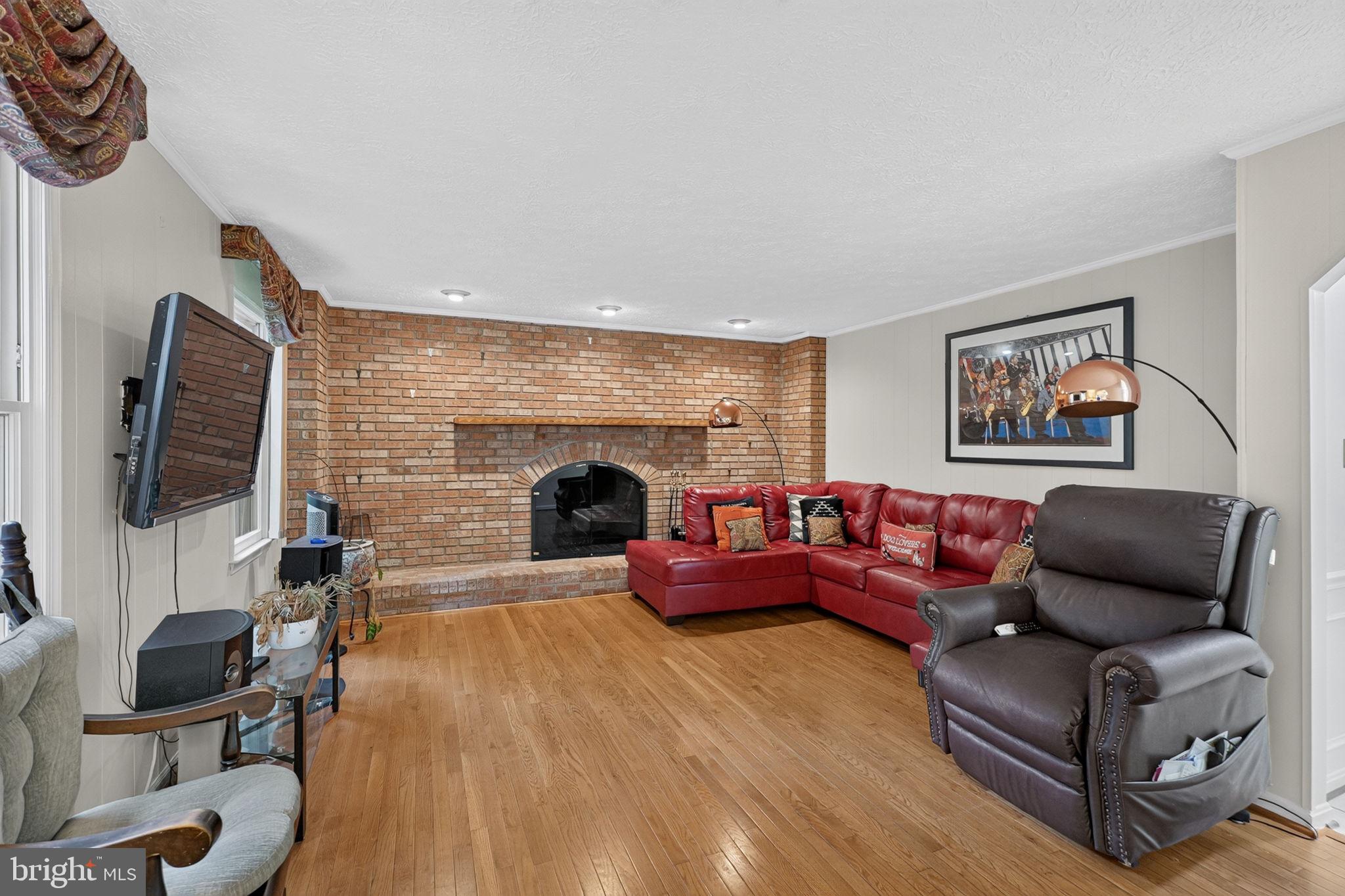14929 Notley Road Silver Spring, MD 20905 - Photo 18 of 69 Family Room with Wood Burning Fireplace