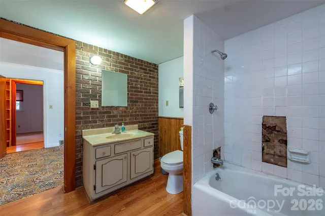 an empty room with a empty space and windows