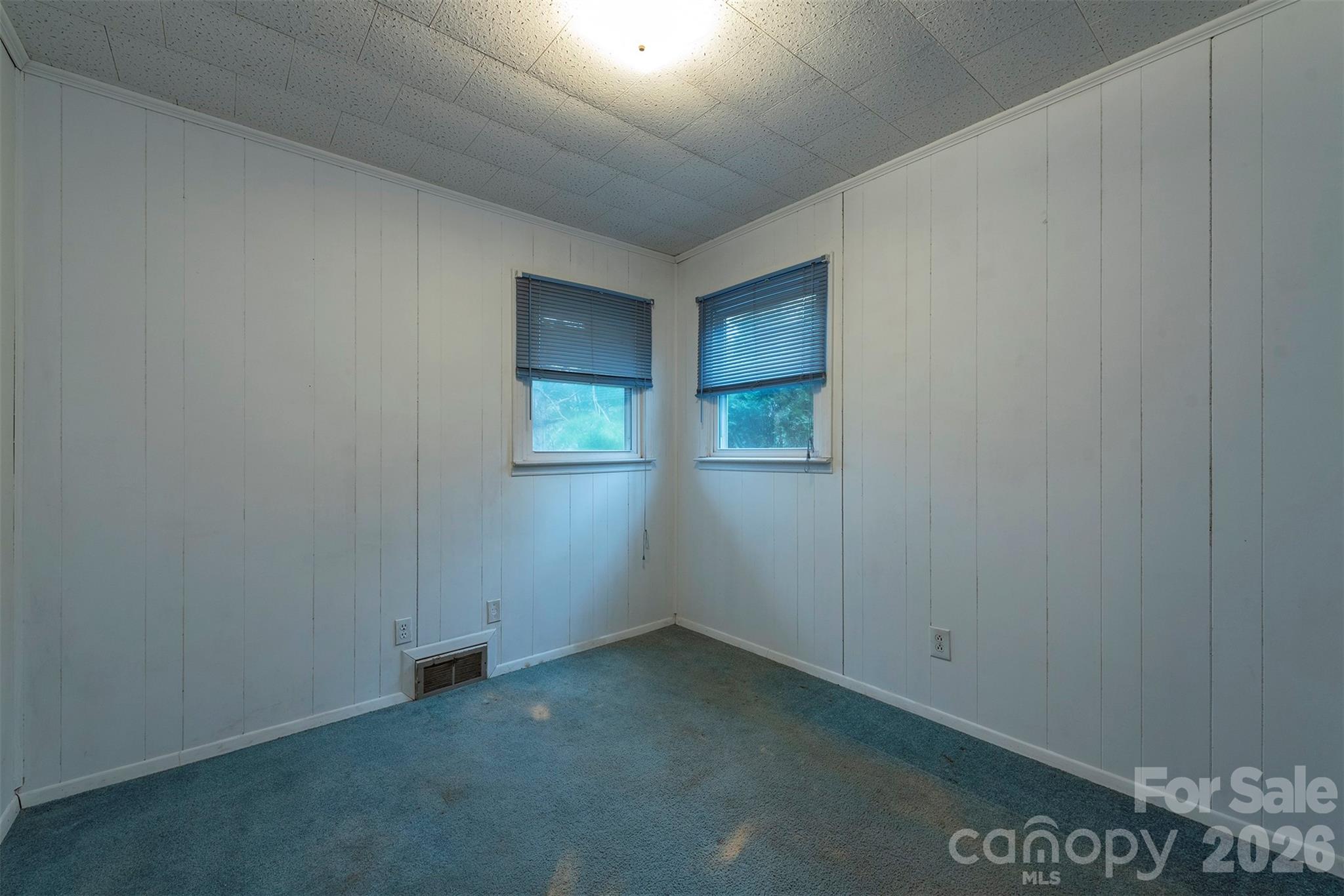 175 River Lane Canton, NC 28716 - Photo 18 of 35 an empty room with a empty space and windows