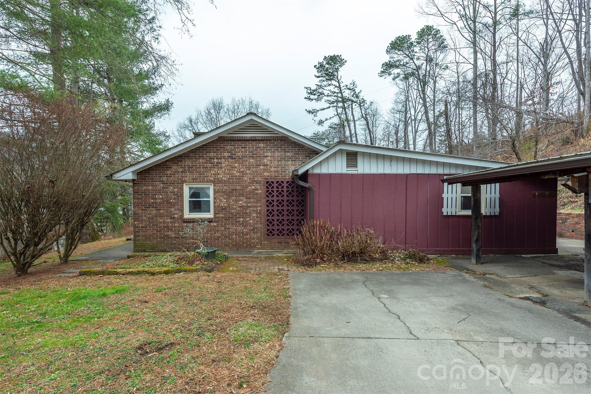 175 River Lane Canton, NC 28716 - Photo 2 of 35 a view of a small house with yard
