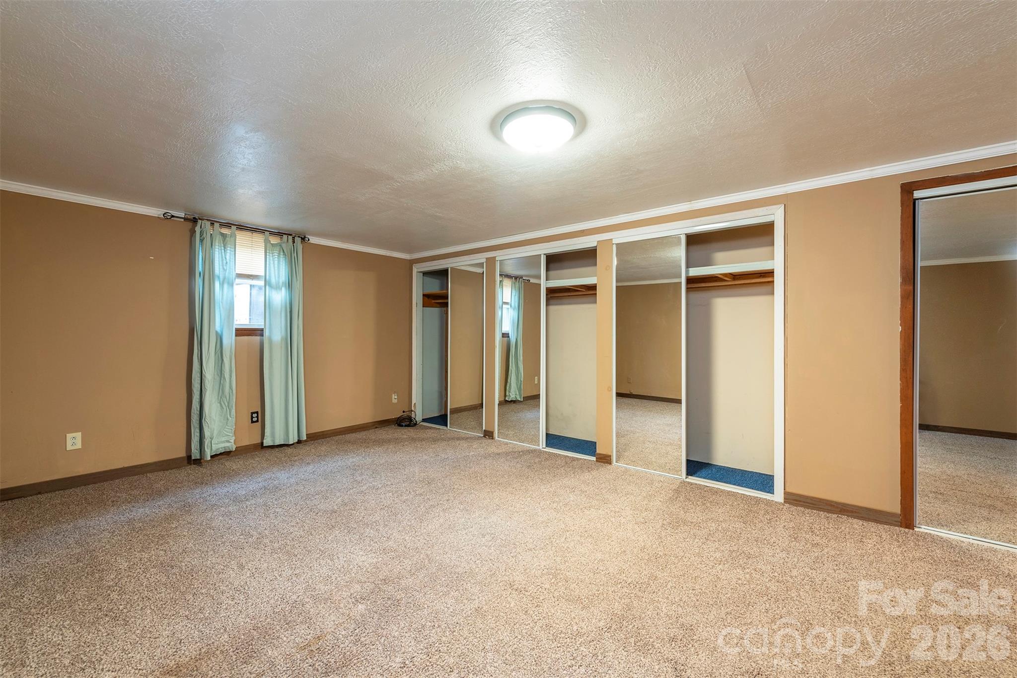 175 River Lane Canton, NC 28716 - Photo 22 of 35 an empty room with closet area