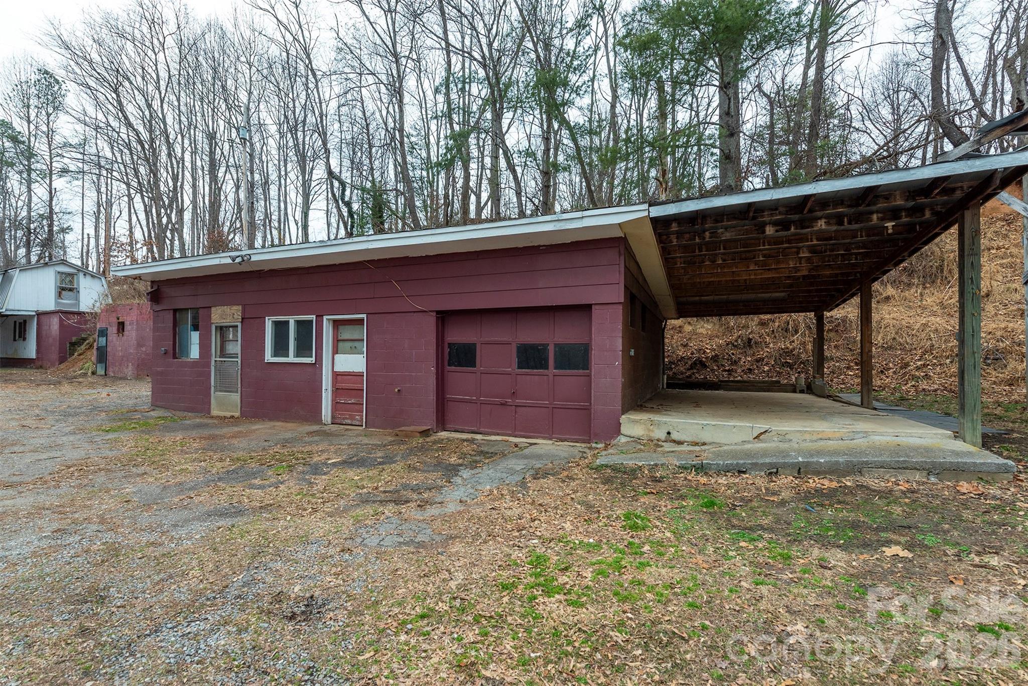 175 River Lane Canton, NC 28716 - Photo 27 of 35 a view of a house with a yard