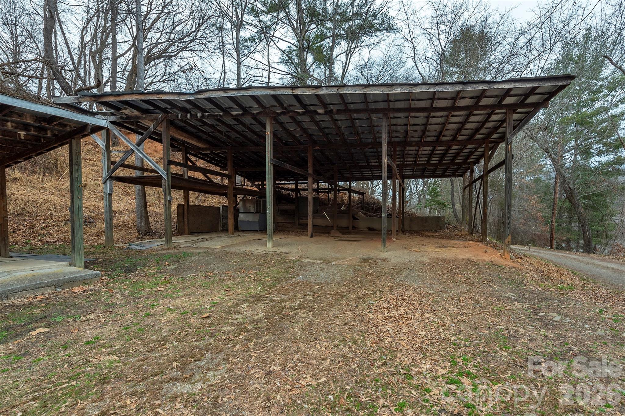 175 River Lane Canton, NC 28716 - Photo 28 of 35 a view of a wooden deck with a backyard