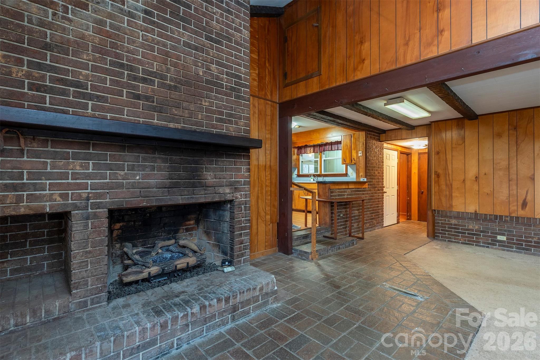 175 River Lane Canton, NC 28716 - Photo 7 of 35 a view of an empty room with a fireplace