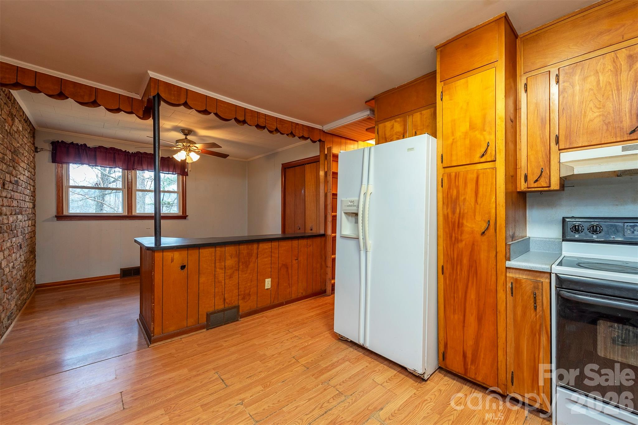 175 River Lane Canton, NC 28716 - Photo 10 of 35 a view of kitchen and utility room