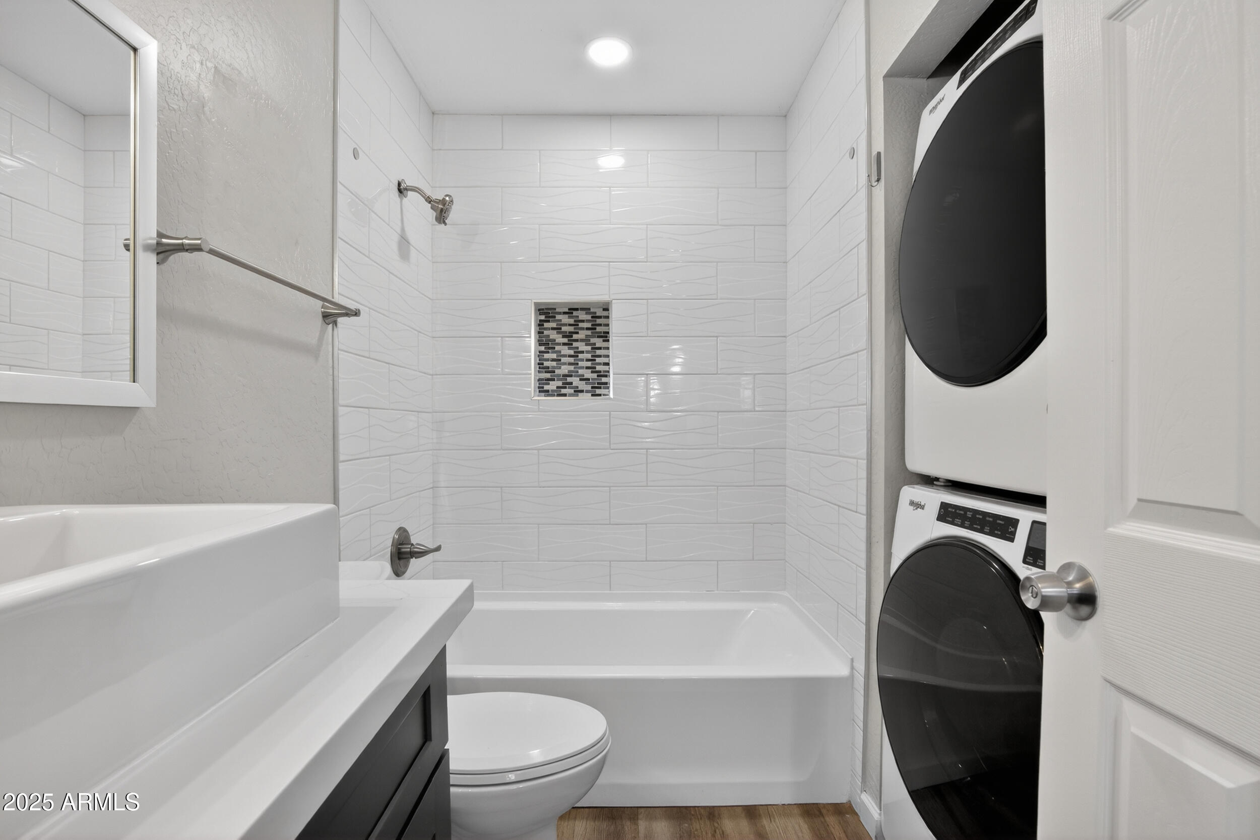 1110 North 10th Street, Unit 2 Phoenix, AZ 85006 - Photo 19 of 22 a bathroom with a toilet bathtub and a shower