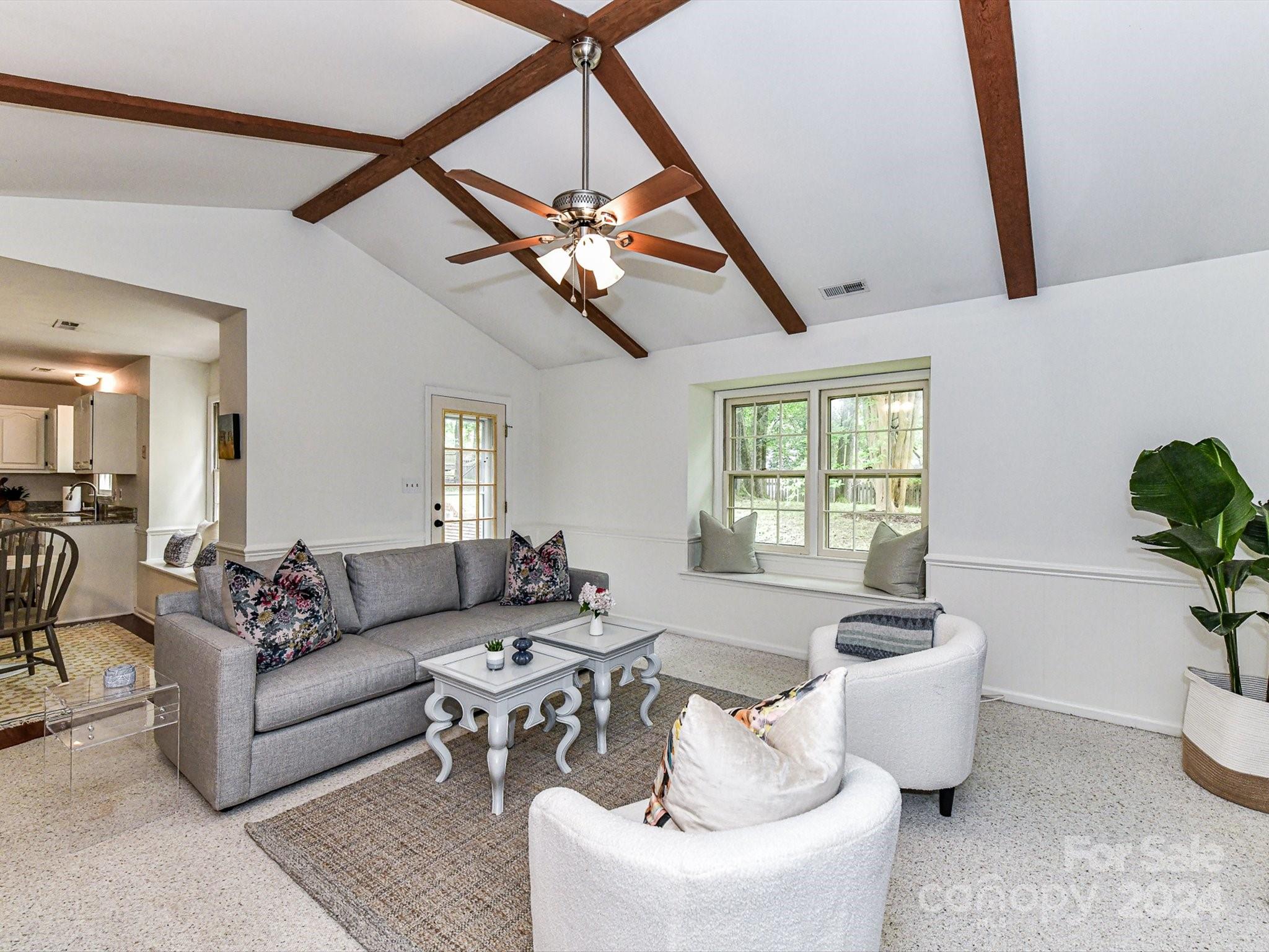 717 Fredricksburg Road Matthews, NC 28105 - Photo 18 of 34 a living room with furniture and a large window