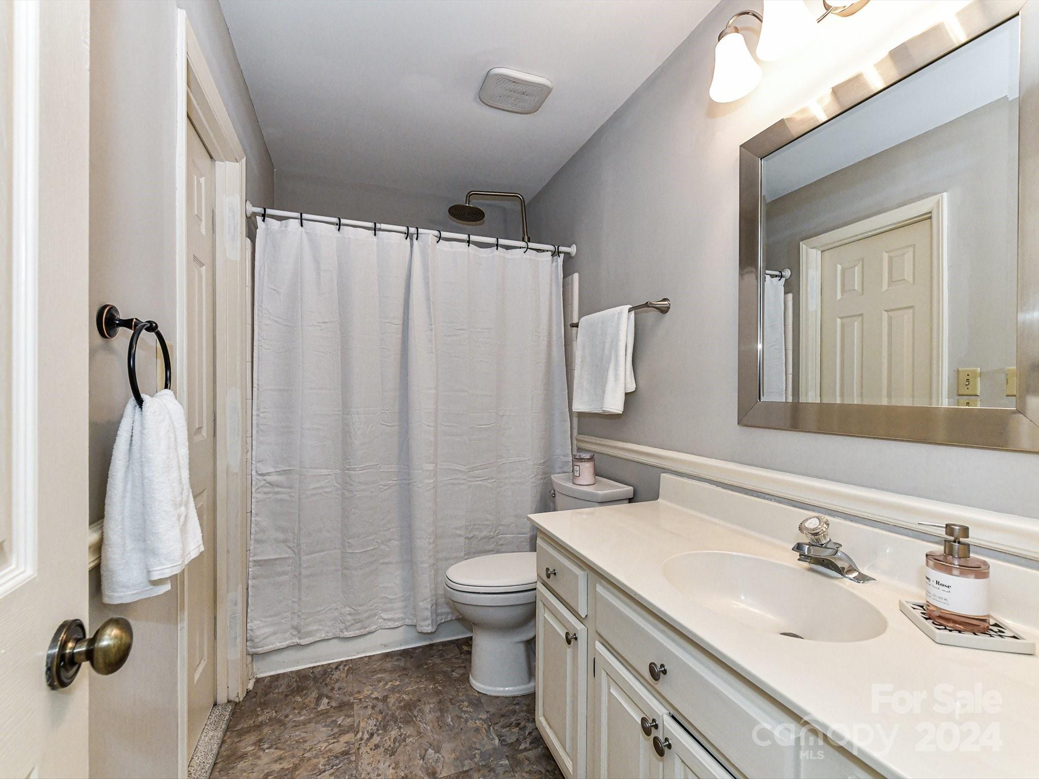 717 Fredricksburg Road Matthews, NC 28105 - Photo 27 of 34 a bathroom with a sink toilet and shower