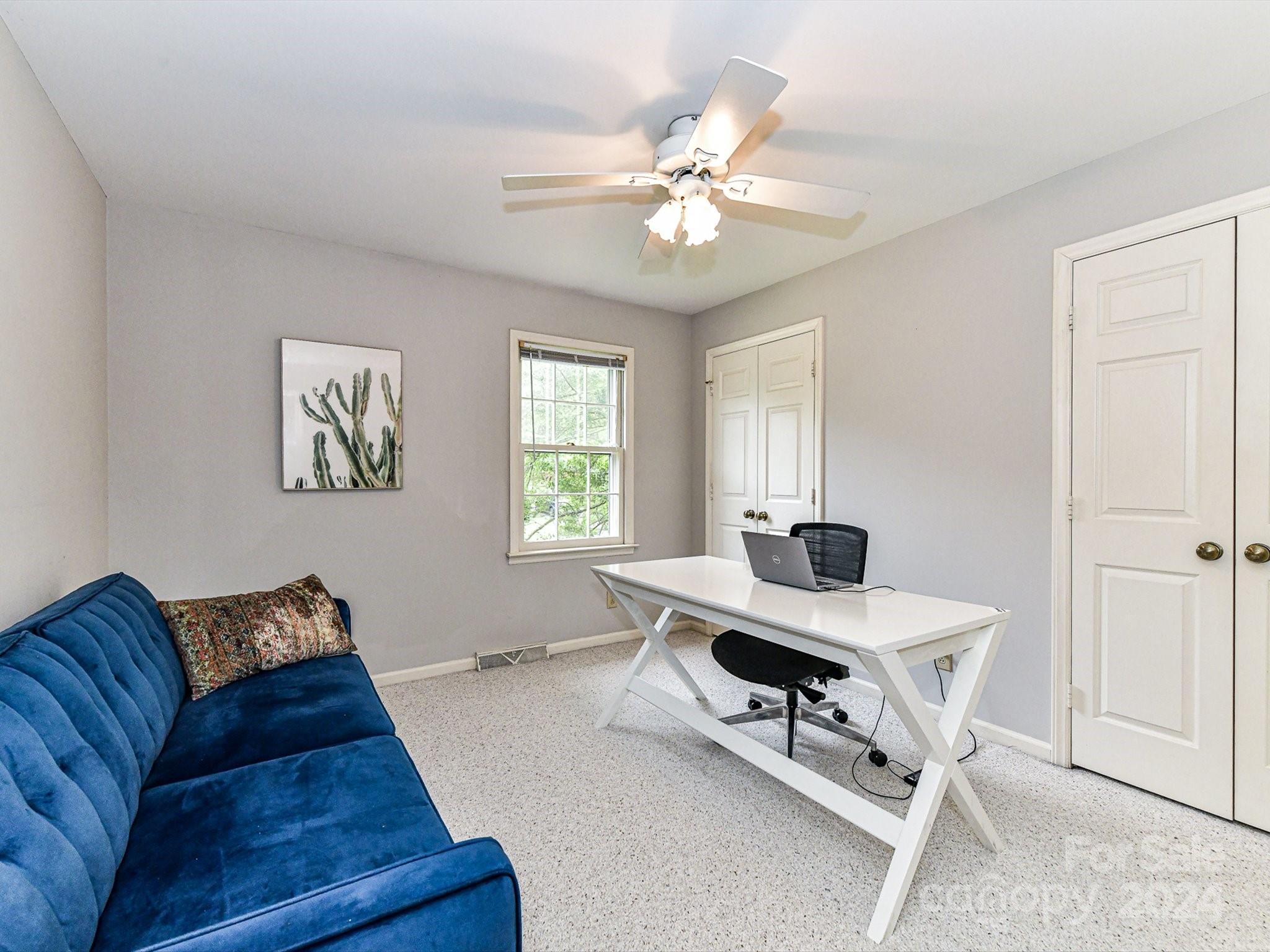717 Fredricksburg Road Matthews, NC 28105 - Photo 28 of 34 a living room with furniture and window