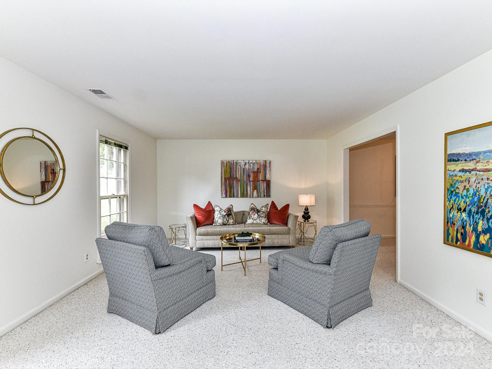 717 Fredricksburg Road Matthews, NC 28105 - Photo 5 of 34 a living room with furniture and a window