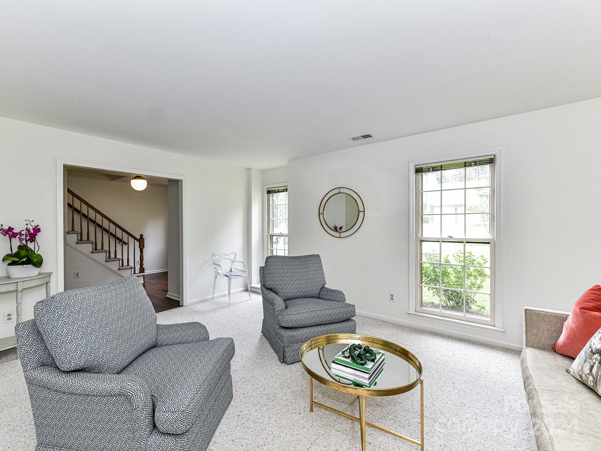 717 Fredricksburg Road Matthews, NC 28105 - Photo 7 of 34 a living room with furniture and a window