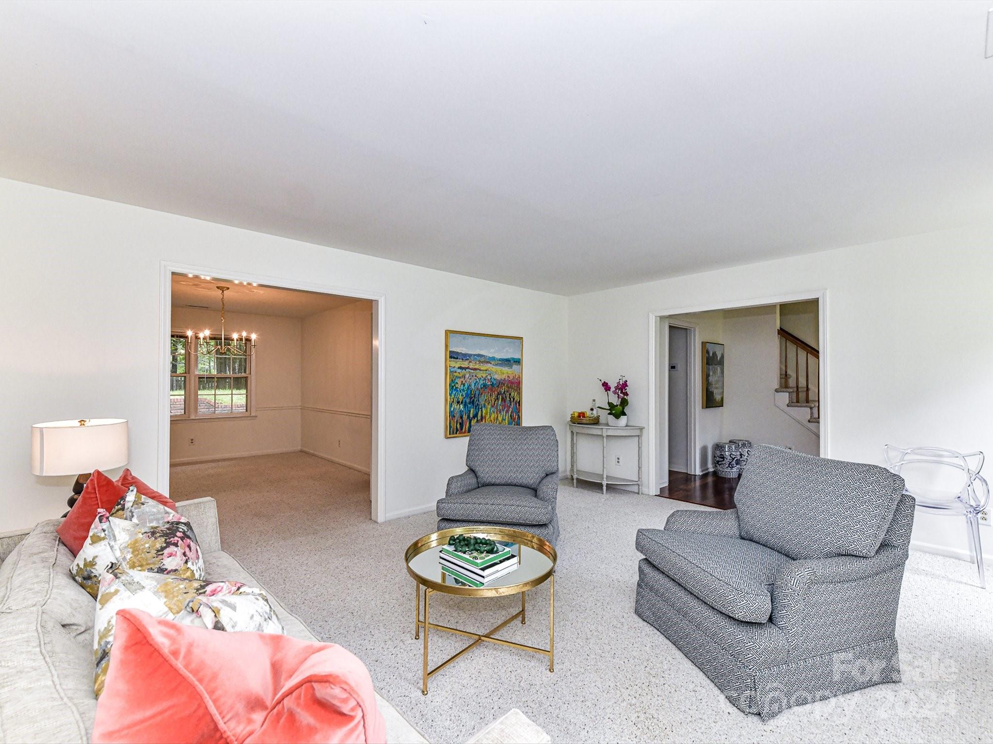 717 Fredricksburg Road Matthews, NC 28105 - Photo 8 of 34 a living room with furniture and a wooden floor