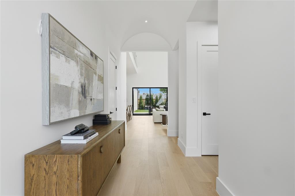 6038 Prospect Avenue Dallas, TX 75206 - Photo 3 of 40 Bright interior hallway featuring light wood-finish flooring