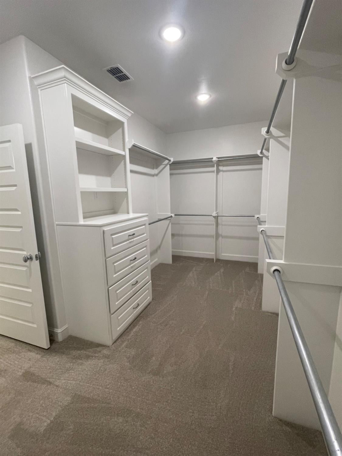 5718 119th Lubbock, TX 79424 - Photo 9 of 17 a view of an empty walk in closet