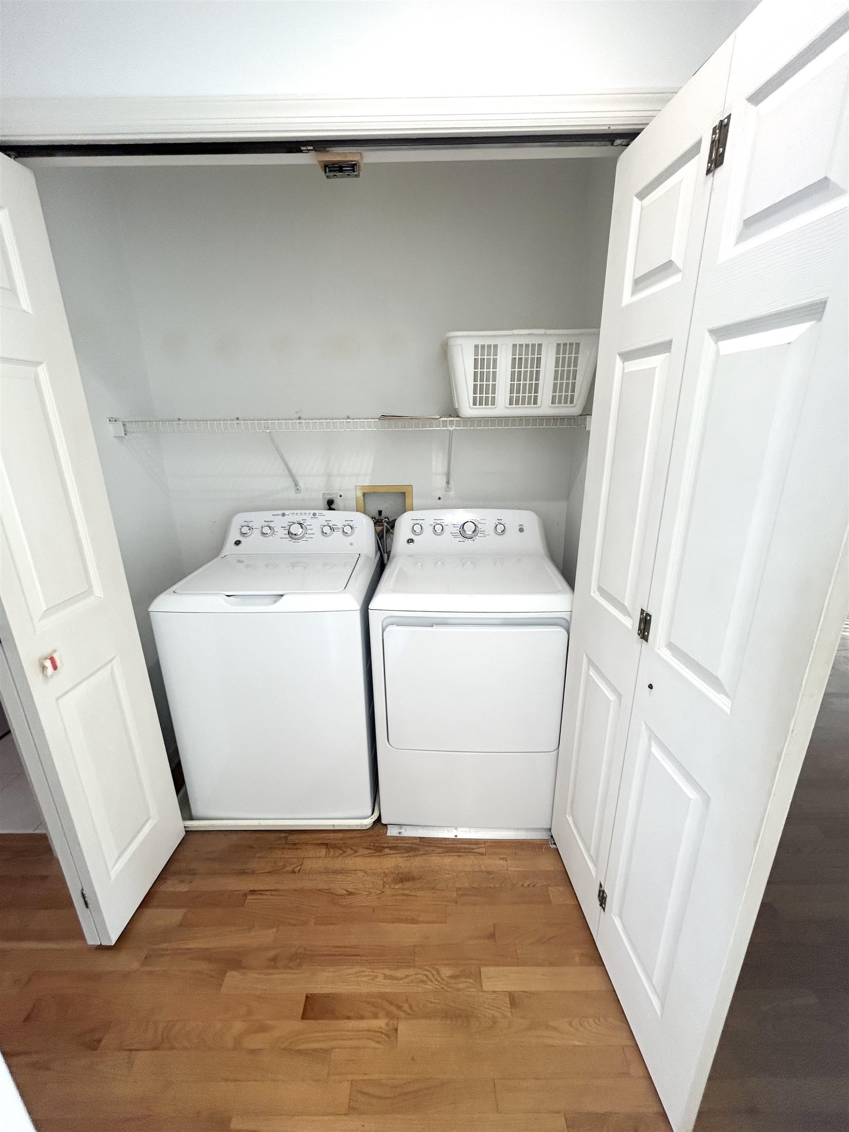 302 Grand Ridge Drive, Unit 302 Ridgefield, NJ 07657 - Photo 17 of 47 a utility room with dryer and washer
