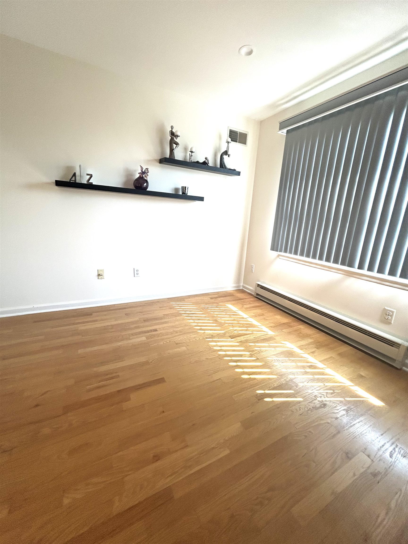 302 Grand Ridge Drive, Unit 302 Ridgefield, NJ 07657 - Photo 18 of 47 a view of a room with an empty space